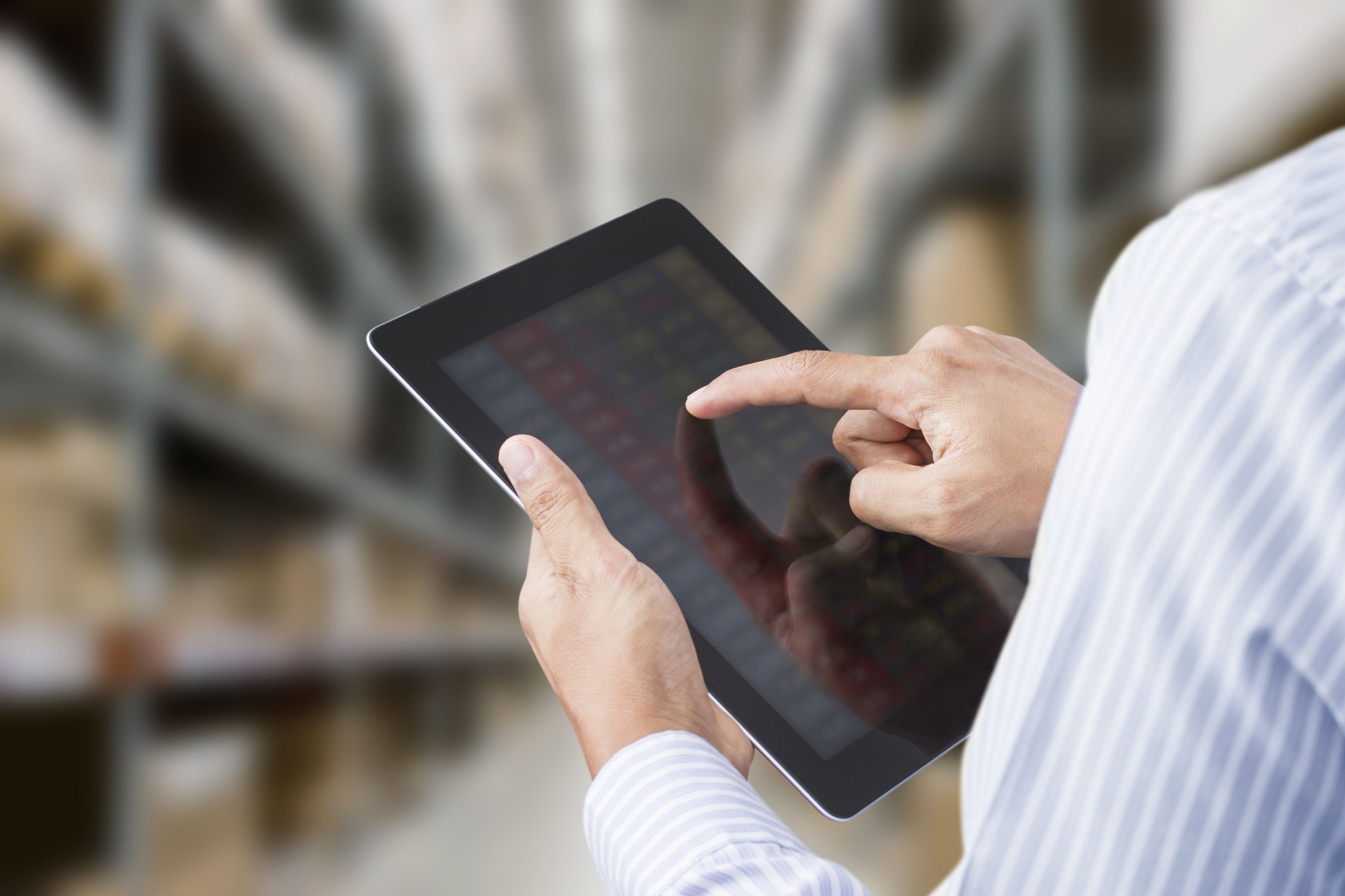 Man watching videos on a tablet